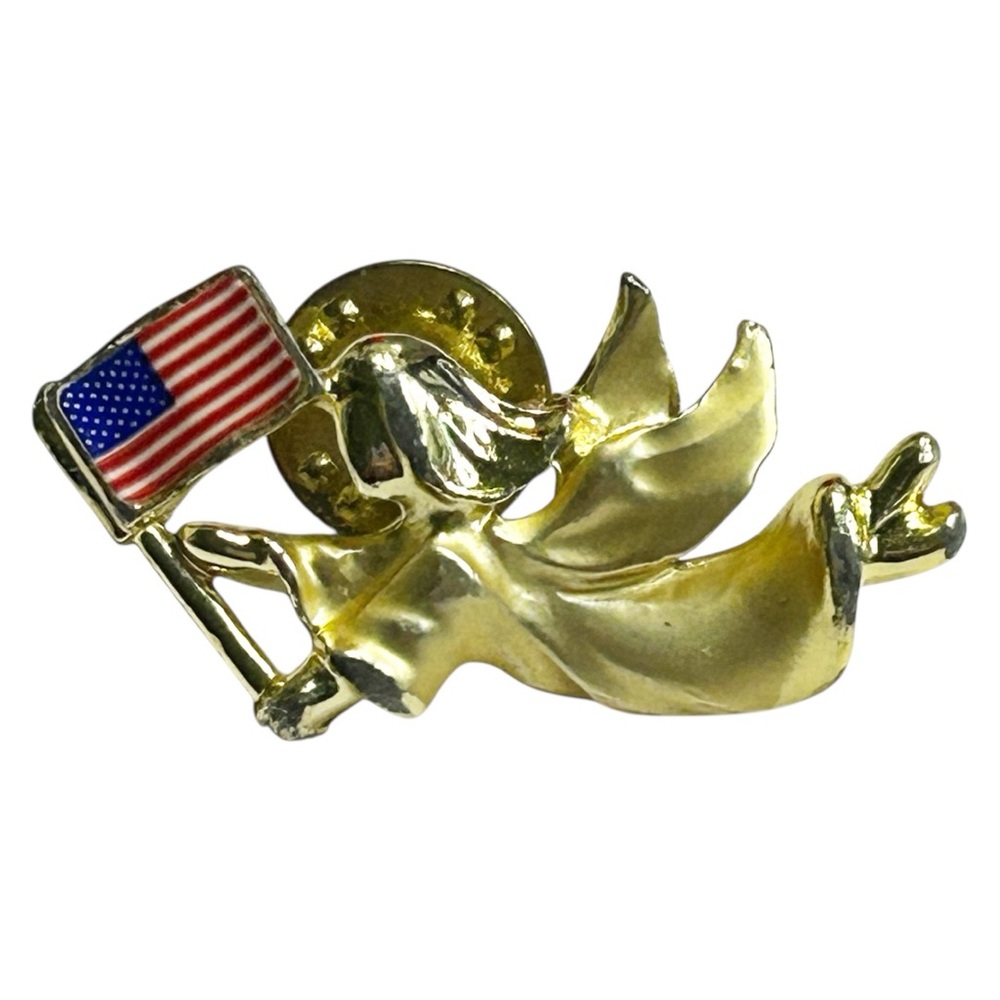Vintage Gigi’s signed gold plated angel patriotic pin holding an American flag